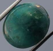 Forest green 9.52ct Grandidierite cabochon