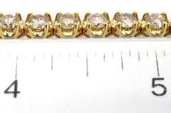 Stunning 7.01CTW Diamond Tennis Bracelet in 14KT Yellow Gold