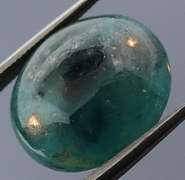 Forest green 9.52ct Grandidierite cabochon