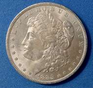 1885-O B U MORGAN DOLLAR