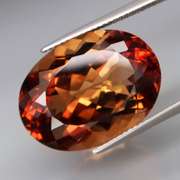 Outstanding 24.77ct eye clean whiskey red Imperial Topaz