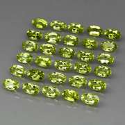 Real 7.55ct untreated apple green Peridot set