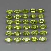 Real 7.55ct untreated apple green Peridot set