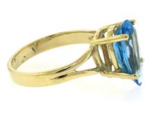 Incredible Yellwo Gold Blue Topaz Ring