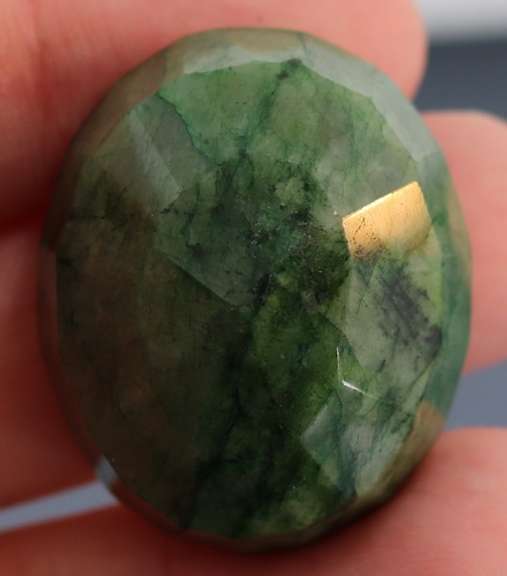 Large 97ct oval cut forest green Emerald