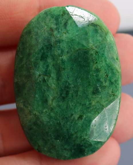 Large 168.5ct oval cut forest green Emerald