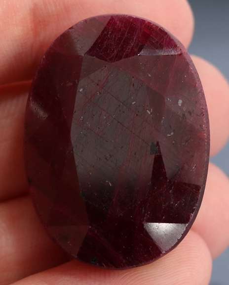 Fiery 154.5ct oval cut rich red Ruby