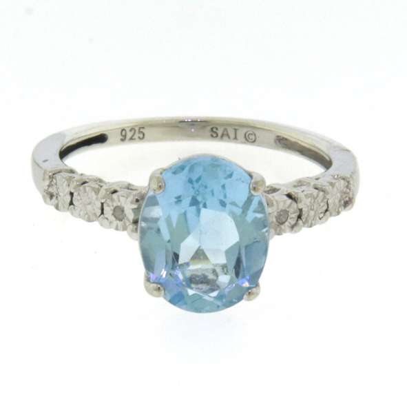 Romantic White Gold Blue Topaz Ring