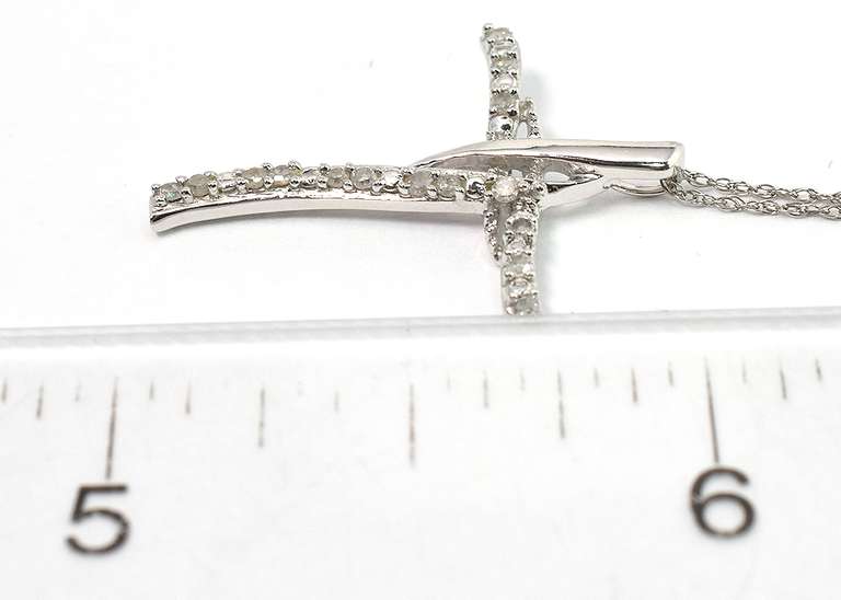 Sweet 1/10CTW Diamond Cross Necklace in White Gold