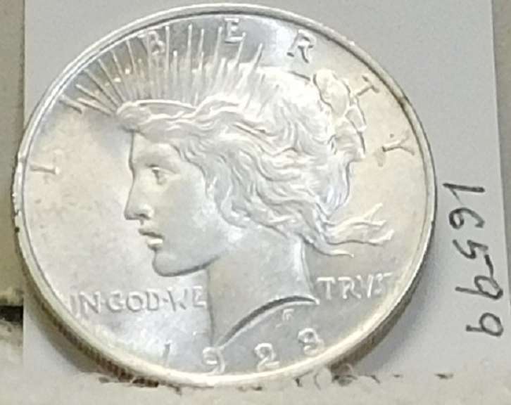 1923 Peace Dollar, near Unc