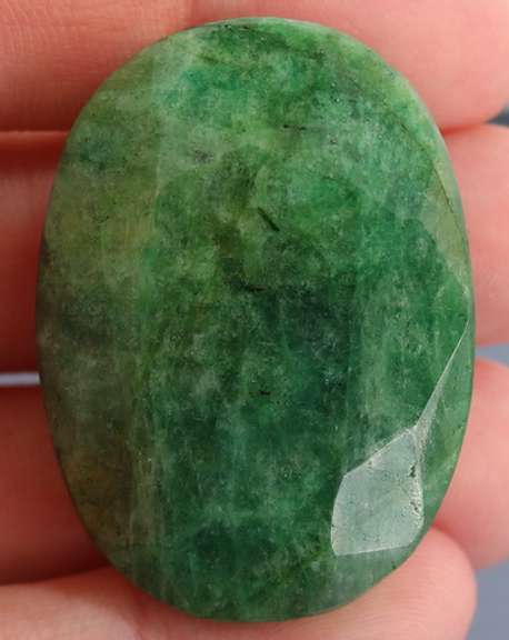 Large 148ct oval cut forest green Emerald