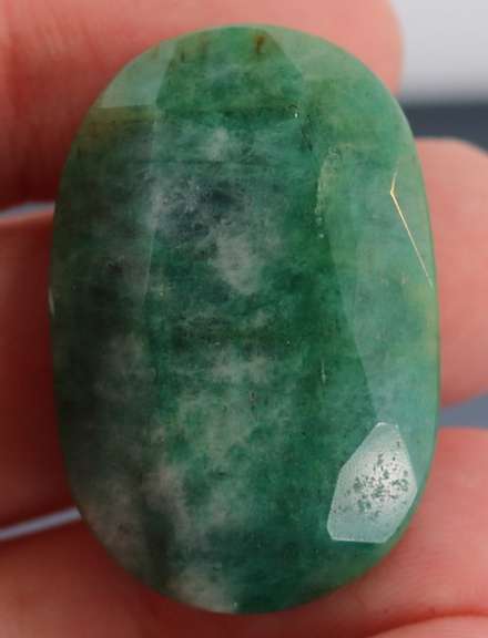 Large 81ct oval cut forest green Emerald
