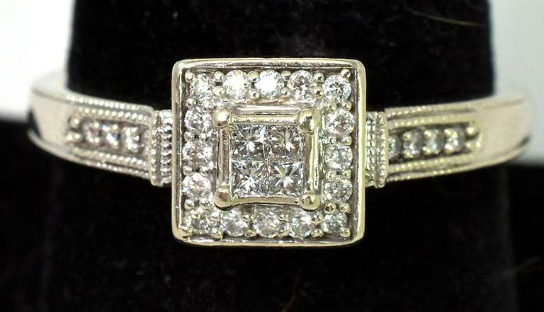 Sparkling 1/5CTW Diamond Halo Ring in White Gold