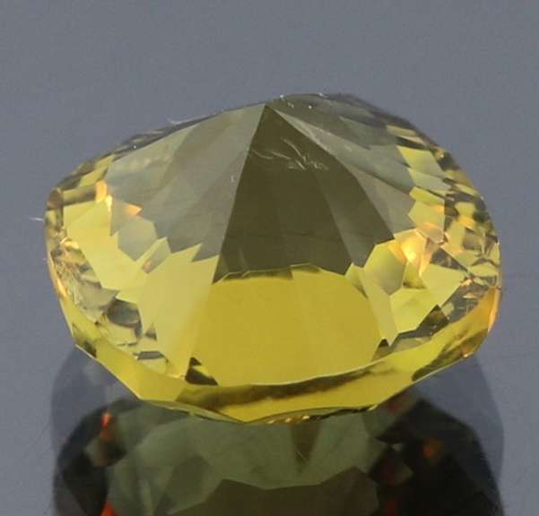 Hypnotizing 5.92ct concave cushion burnished gold Citrine