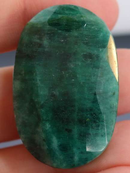 Large 103ct oval cut forest green Emerald