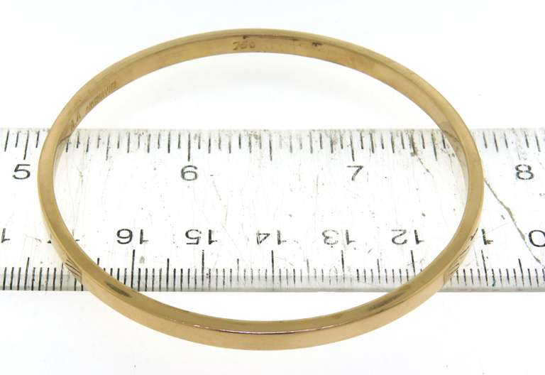 Memorable 18kt Pair of High Polish Bangles