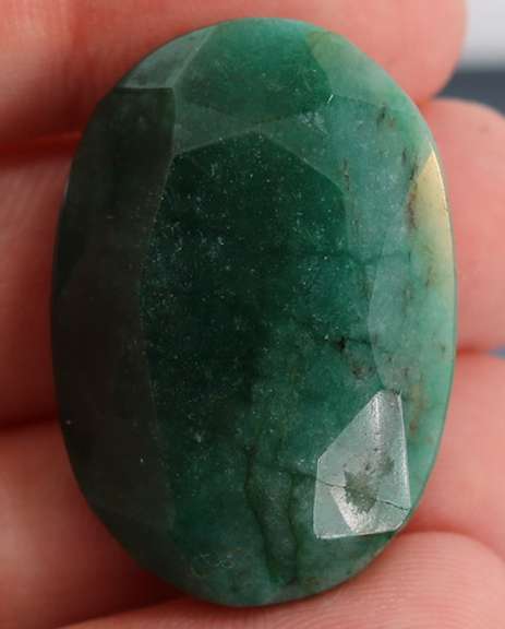 Large 74.5ct oval cut forest green Emerald