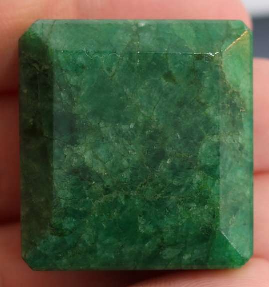 Large 138.5ct emerald cut forest green Emerald