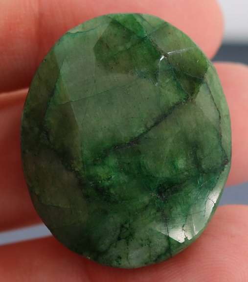 Large 97ct oval cut forest green Emerald