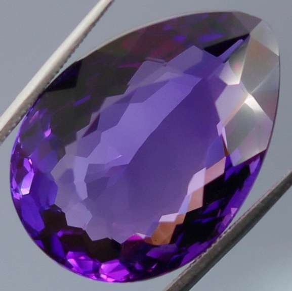 21.54ct pear cut purple created Amethyst