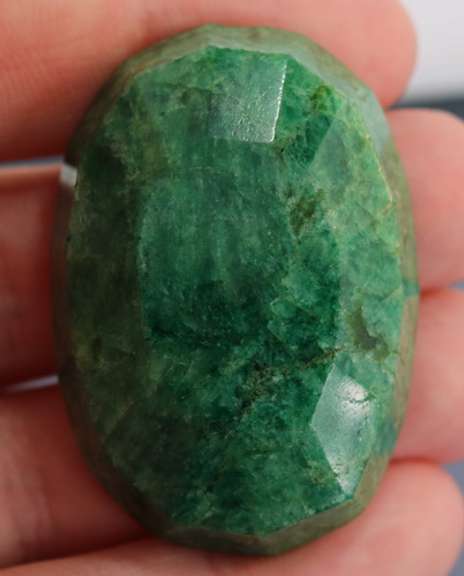 Large 168.5ct oval cut forest green Emerald