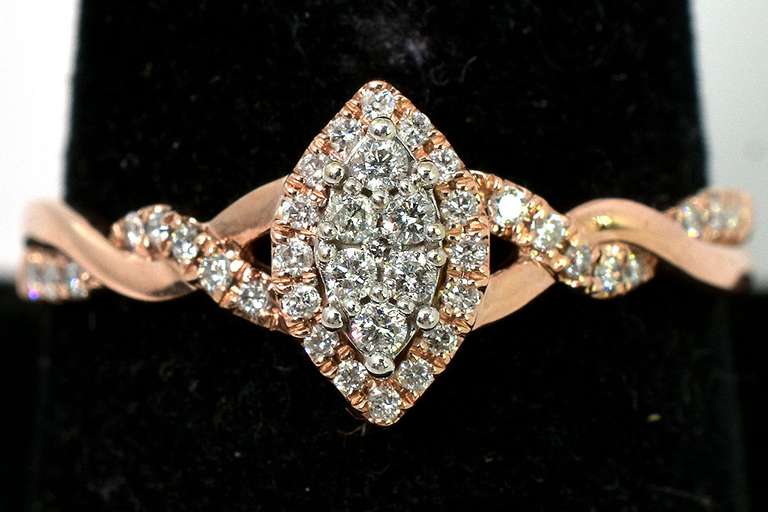 Endearing Twisting Diamond Ring in Rose Gold