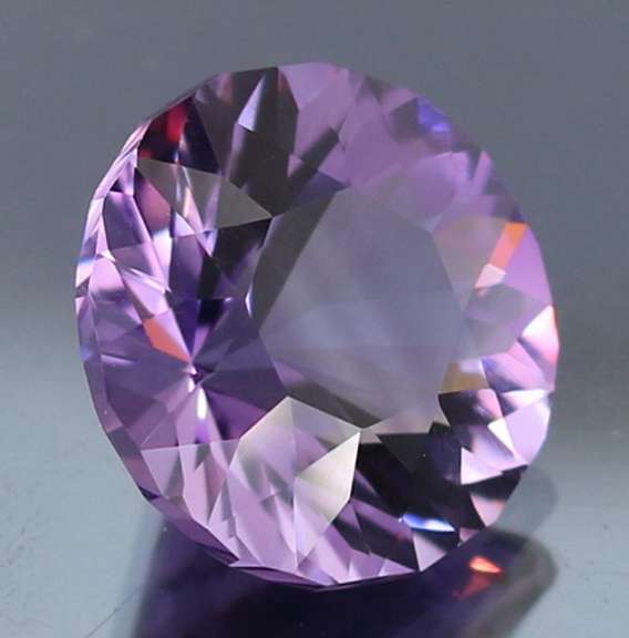 Exceptional 10.64ct color shifting Amethyst solitaire