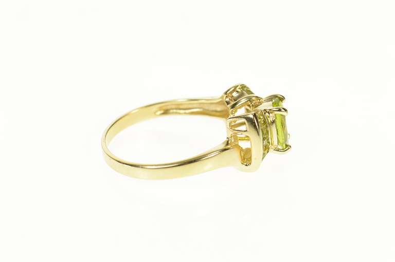 10K Yellow Gold Oval Peridot Semi Halo Statement Ring