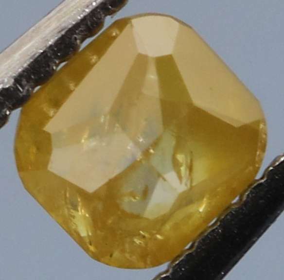 Rare .25ct emerald cut yellow Diamond