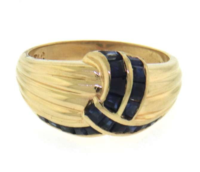 Graceful Blue Sapphire Criss Cross Yellow Gold Ring