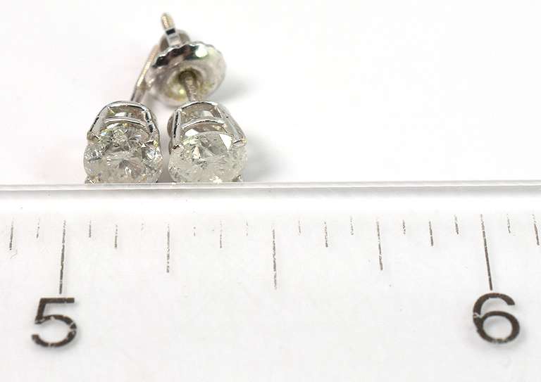 Gorgeous 1.00CTW Diamond Stud Earrings in 14KT White Gold
