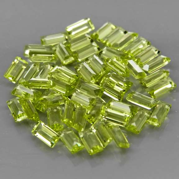 Sparkling 6.15ct bright green peridot set