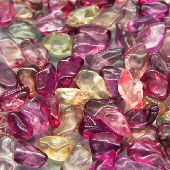 Unheated! 30.65ct fancy color Sapphire set