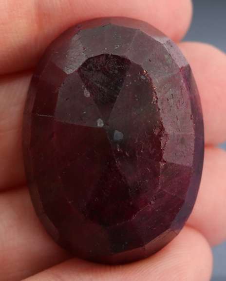 Fiery 154.5ct oval cut rich red Ruby