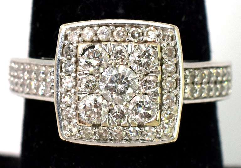 Striking 3/4CTW Diamond Halo Ring in 14KT White Gold