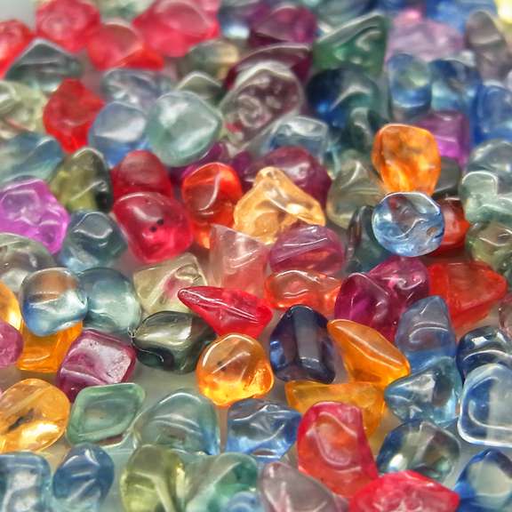 Amazing 24.20ct fancy color unshaped Sapphire set