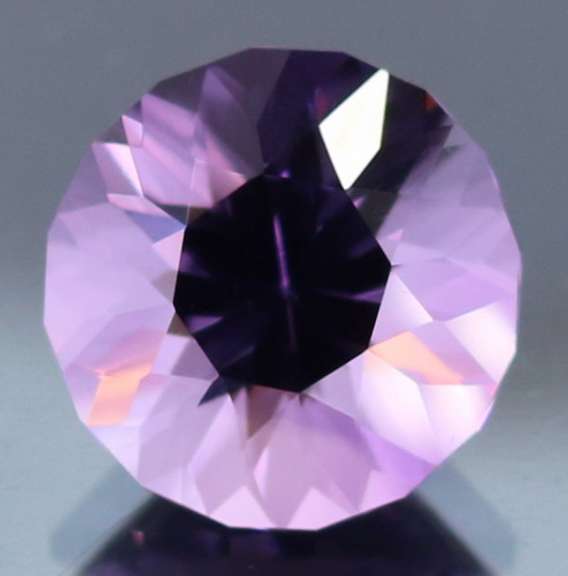 Exceptional 10.64ct color shifting Amethyst solitaire