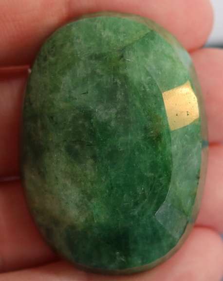 Large 148ct oval cut forest green Emerald