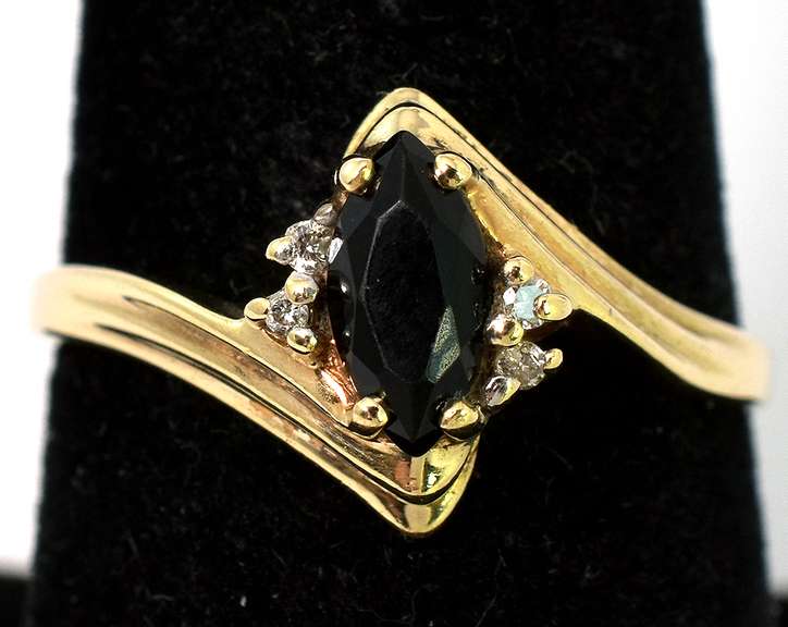 Mysterious Black Stone Ring with Diamond Accents in Yellow Gold