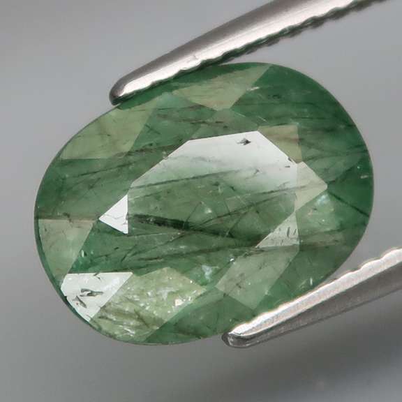 Captivating 3.54ct rutilated Emerald with a silver sheen!