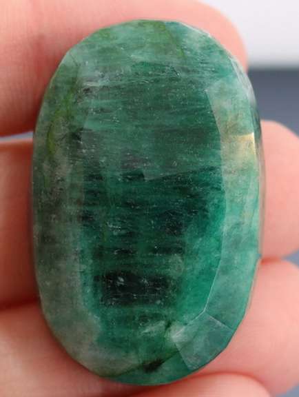 Large 103ct oval cut forest green Emerald