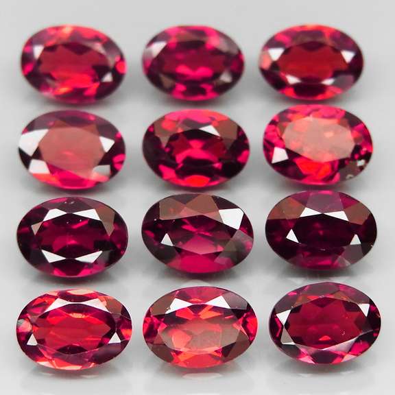 Amazing 11.41ct oval cut cherry red Garnet set