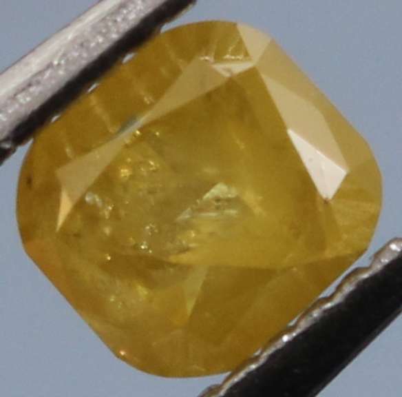 Rare .25ct emerald cut yellow Diamond