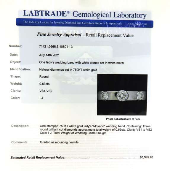 Powerful 18kt Movado Wedding Band