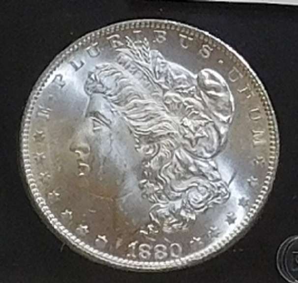 1880-S Morgan Dol PCS Cert Unc.  Exceptional luster and strike.