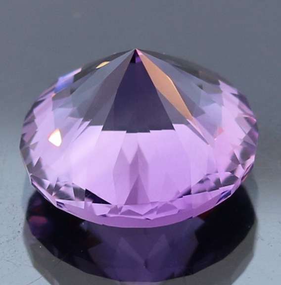 Exceptional 10.64ct color shifting Amethyst solitaire
