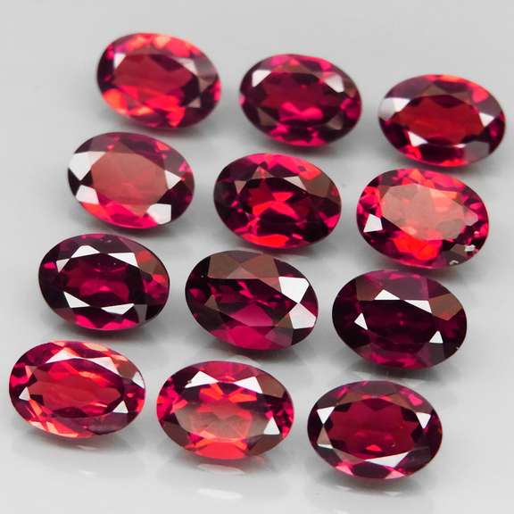 Amazing 11.41ct oval cut cherry red Garnet set