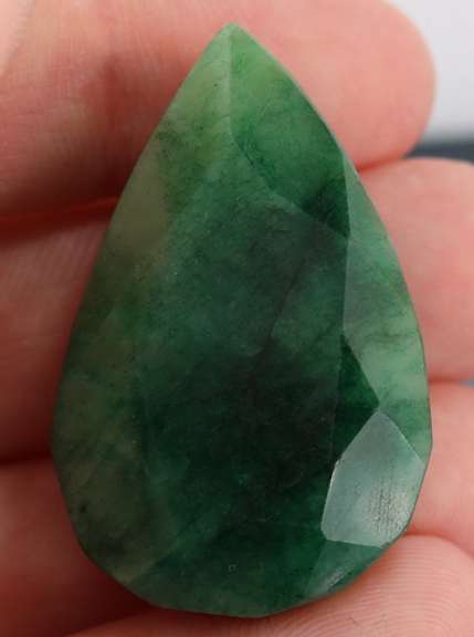 Large 98.5ct pear cut forest green Emerald