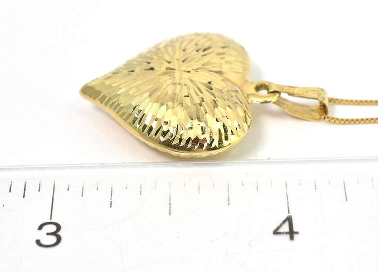 Glittering Textured Heart Necklace in 14KT Yellow Gold