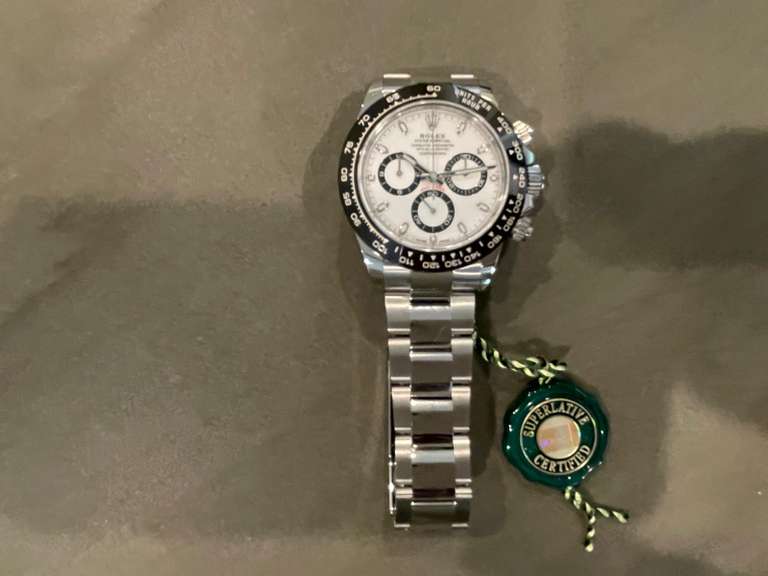Brand New Daytona Rolex with Box and papers, warranty